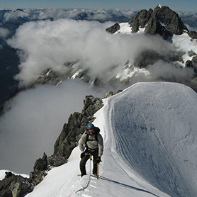 Matt Kitchin on the summit ridge of Mount Tutoko, New Zealand