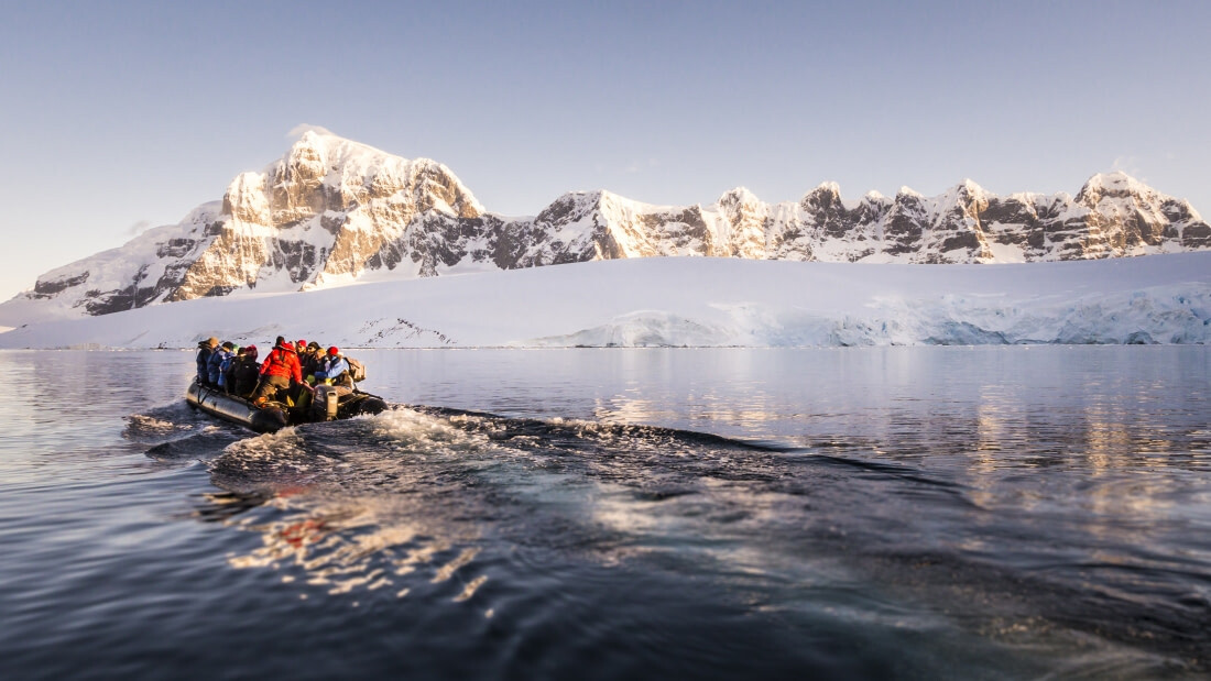 Zodiac cruising on the Antarctic Peninsula in perfect weather