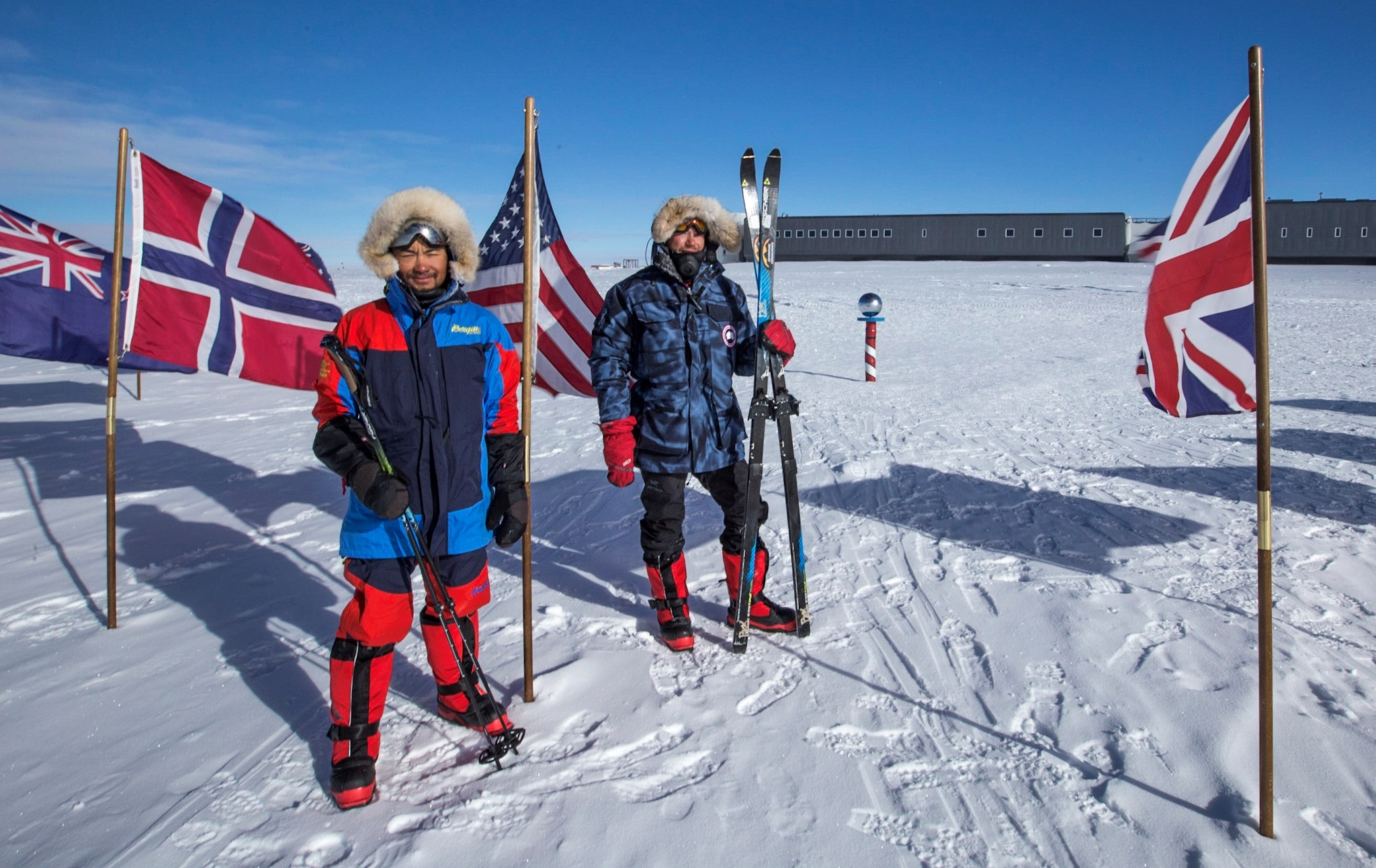 Flags from different nations at the South Pole