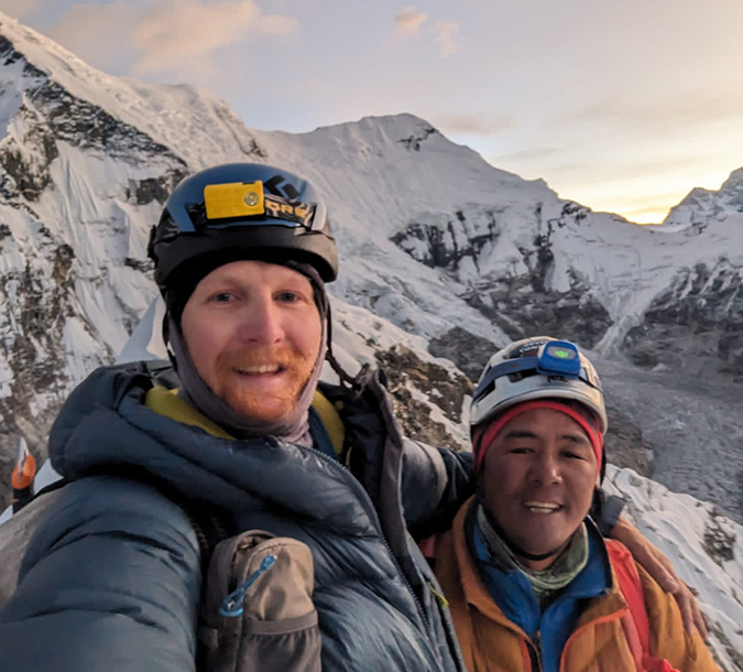 Spencer Hall and AC Guide Da Jangbu Sherpa on the summit of Island Peak.