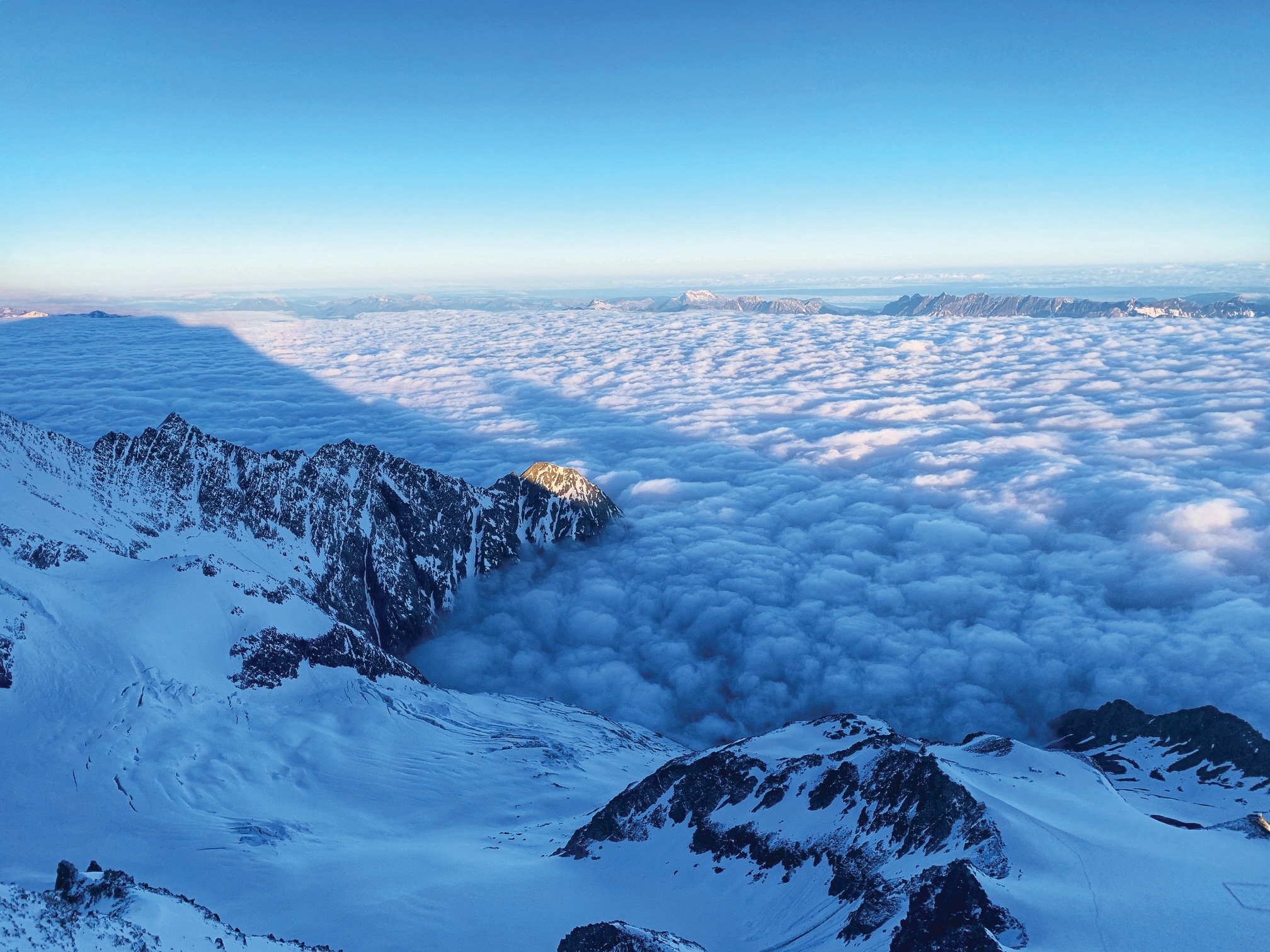 Clouds fill the Chamonix Valley in the European Alps
