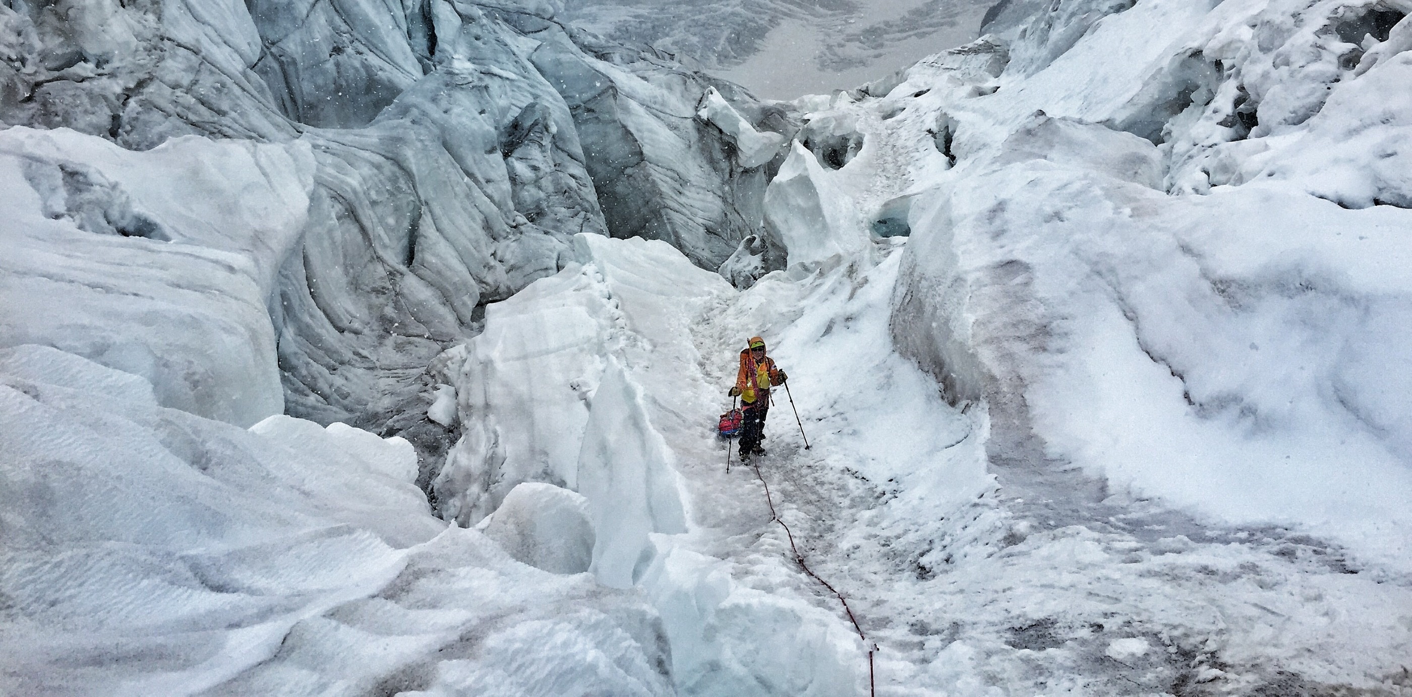 Navigating fixed ropes and use of a sled are specifc expedition skills