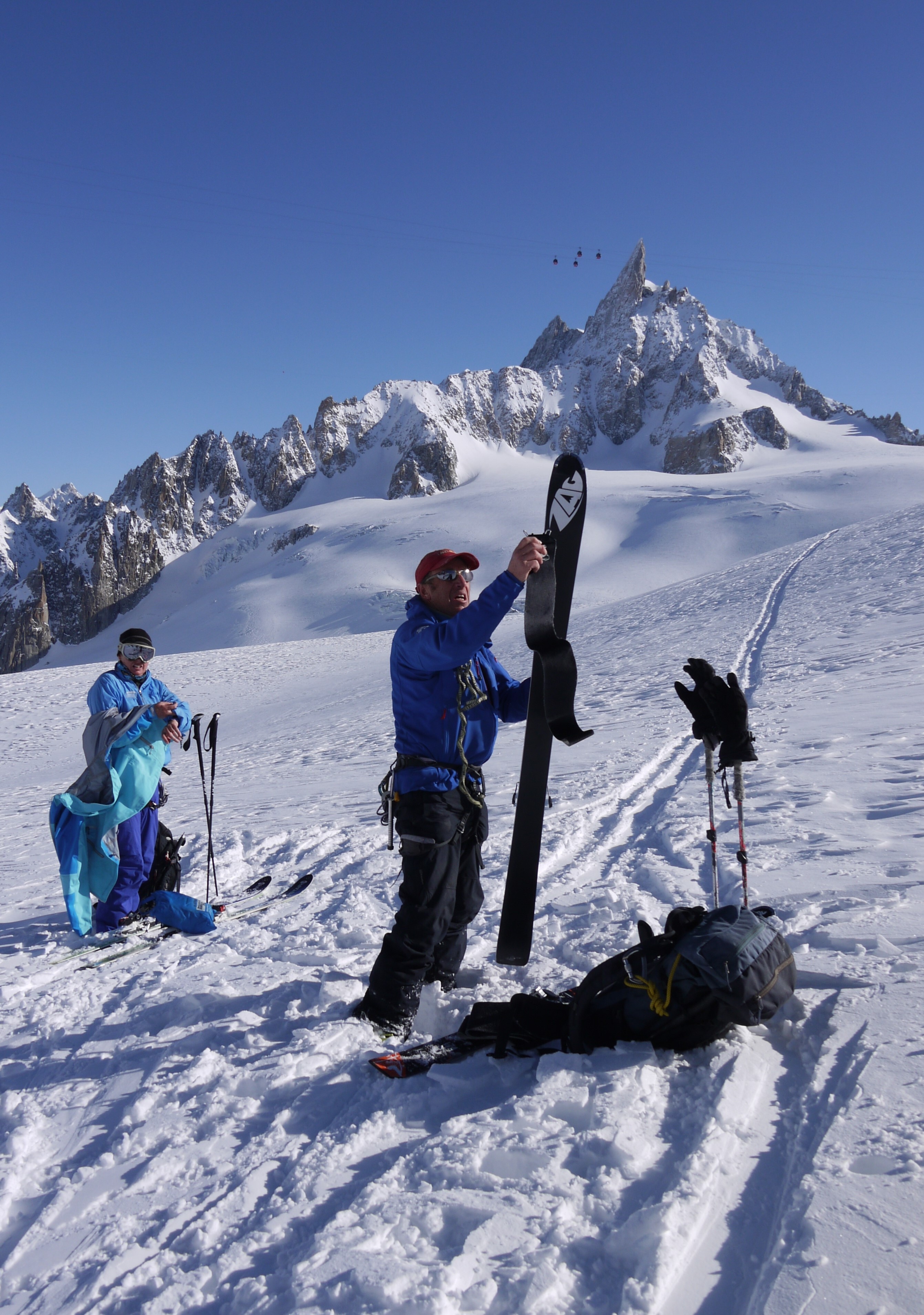 Skiers remove their skins ready for their next run.