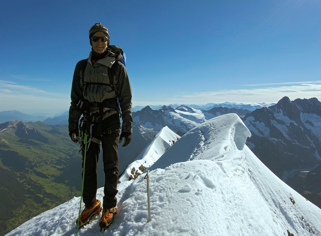 A climber on the Eiger summit in perfect conditions.