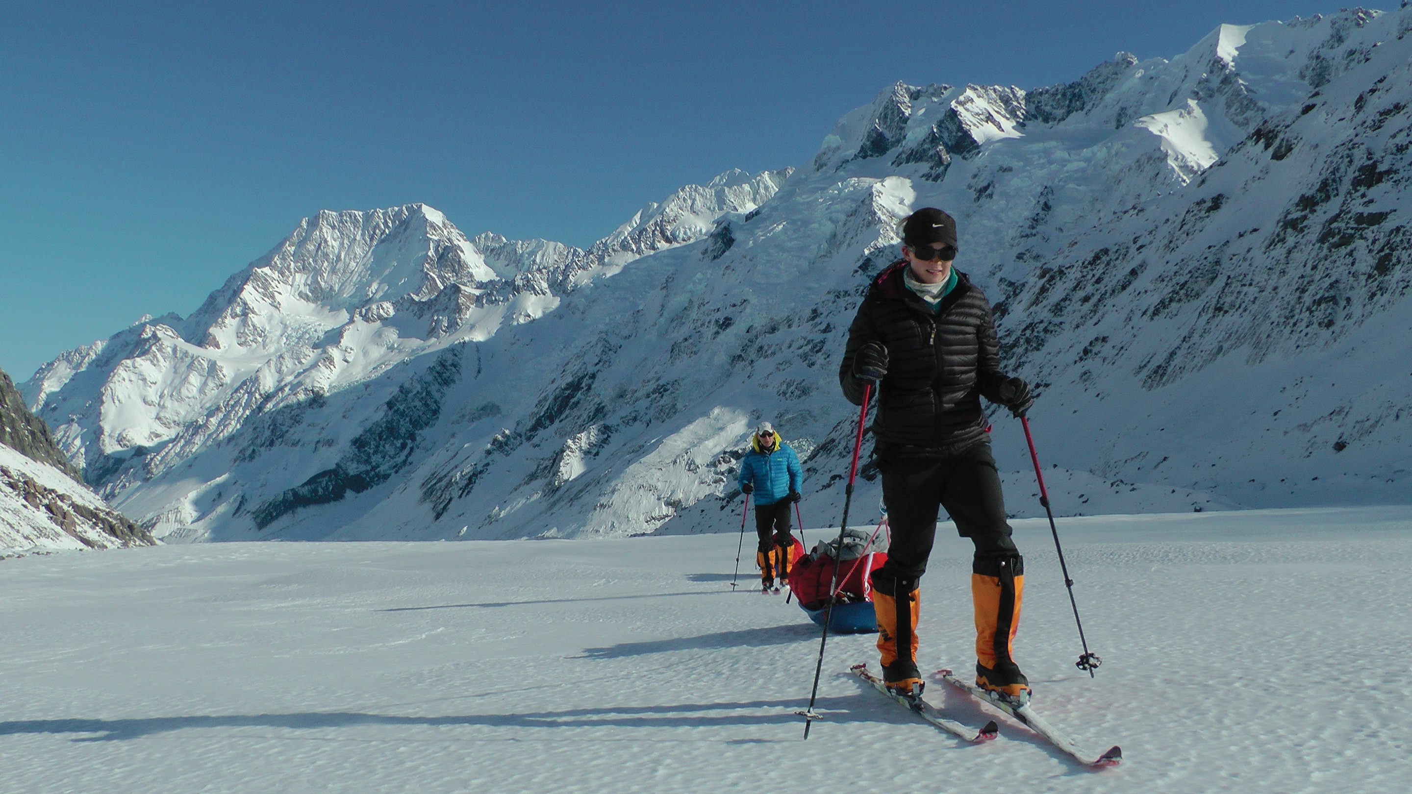 Two prospective polar explorers practice the essential art of hauling a gear laden sleds deep in the New Zealand mountains.