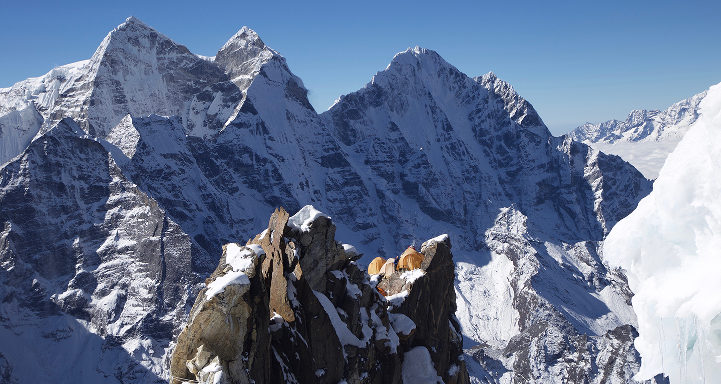 Tents perched precariously on a knife edge ridge at Camp 2 Ama Dablam