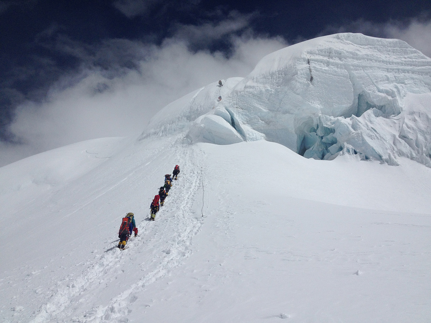 Climbers approach the ice wall on Cho Oyu summit day