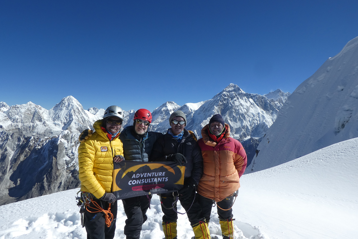 Team celebrating the summit of Cholatse