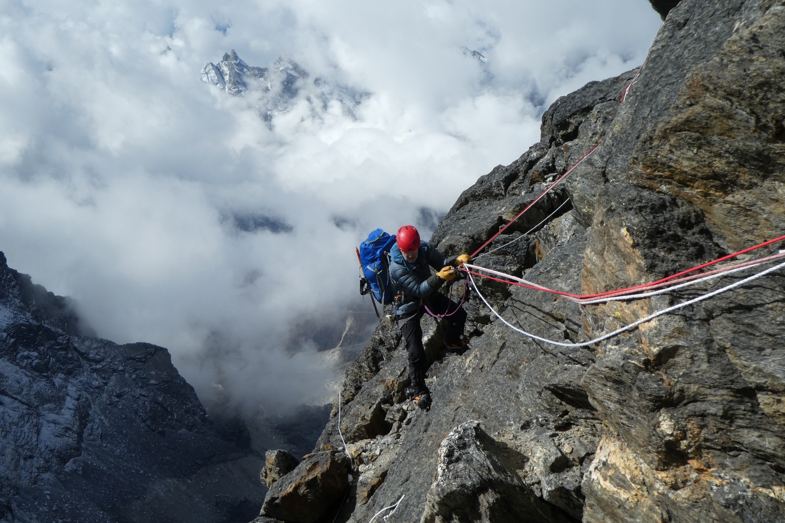 Climbing the rock band on Cholatse