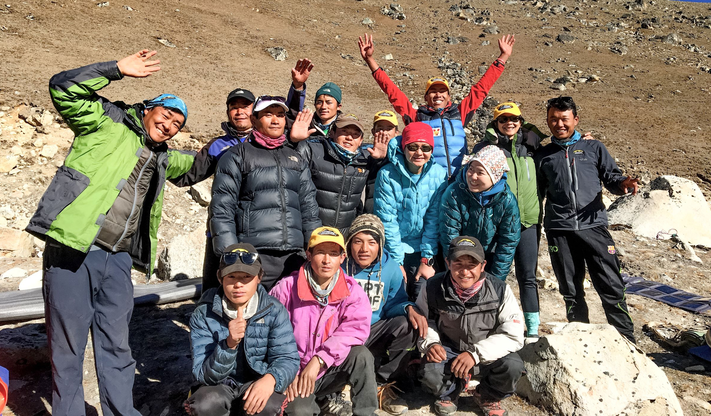 A group celebrate the end of their Luxury Everest Base Camp Trek with the team of hard working Sherpa that have made their trek possible!