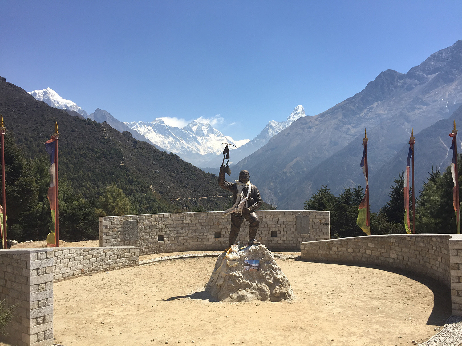 Statue of Tenzing Norgay Sherpa at Namche Bazar with Everest, Lhotse and Ama Dablam in the background.