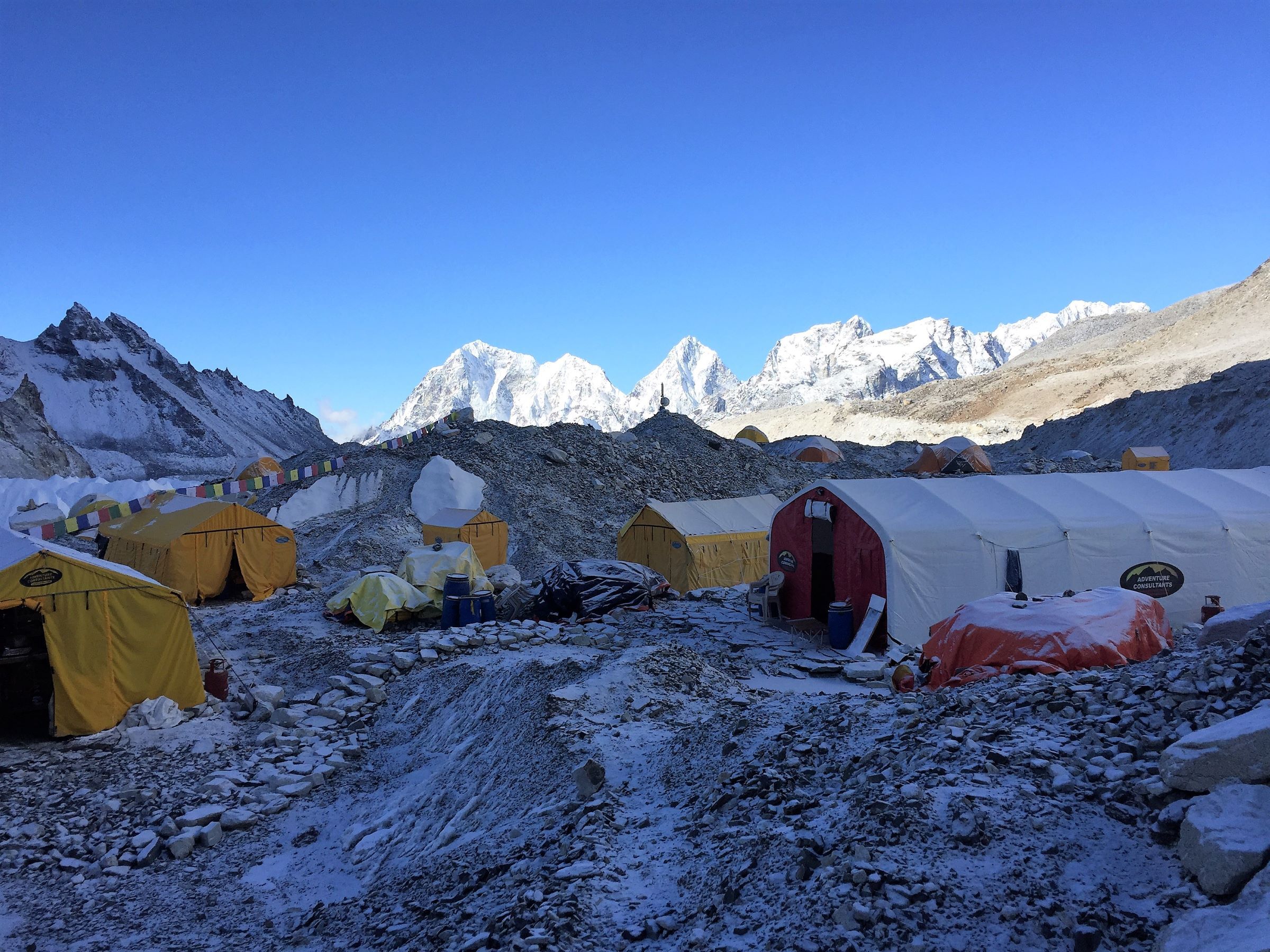 The Adventure Consultants Everest Basecamp with the spectacular peaks to the south including Cholatse catching the sun first thing in the morning.