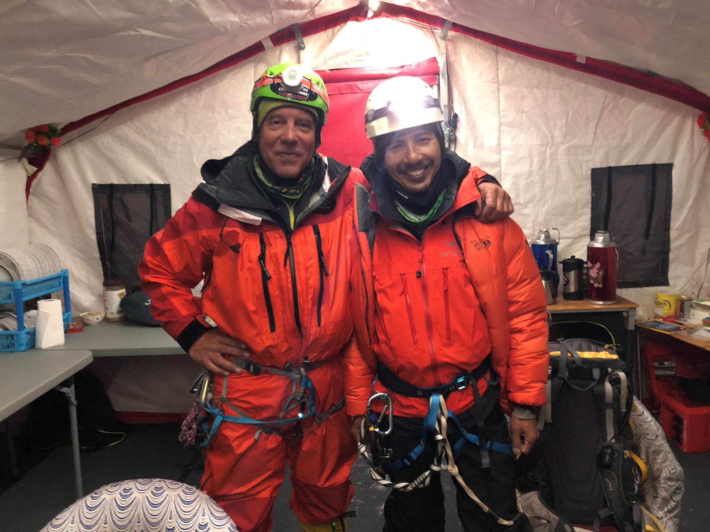 Guide and climber about to depart base camp for the summit