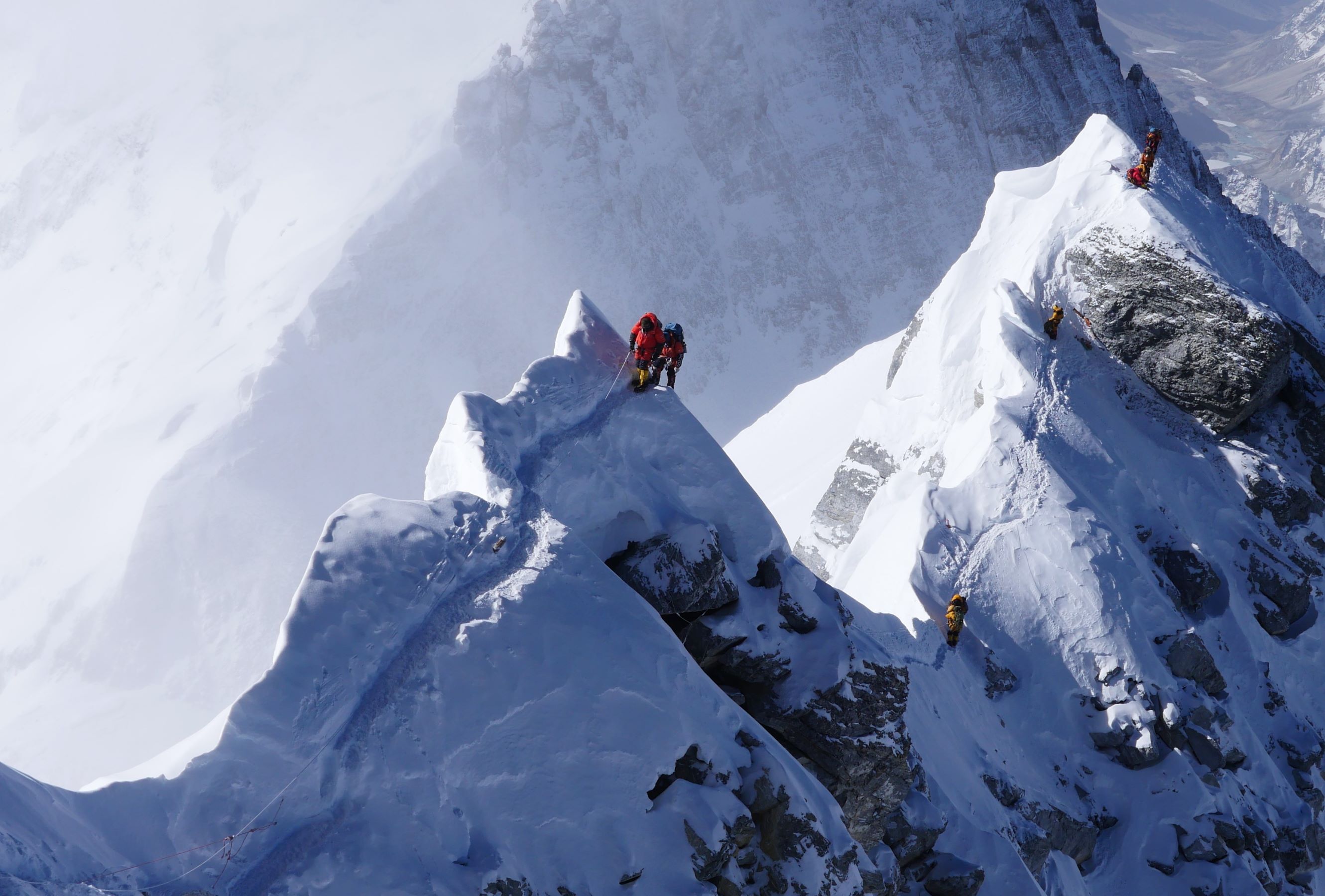Climbers on summit ridge and South Summit of Mt Everest