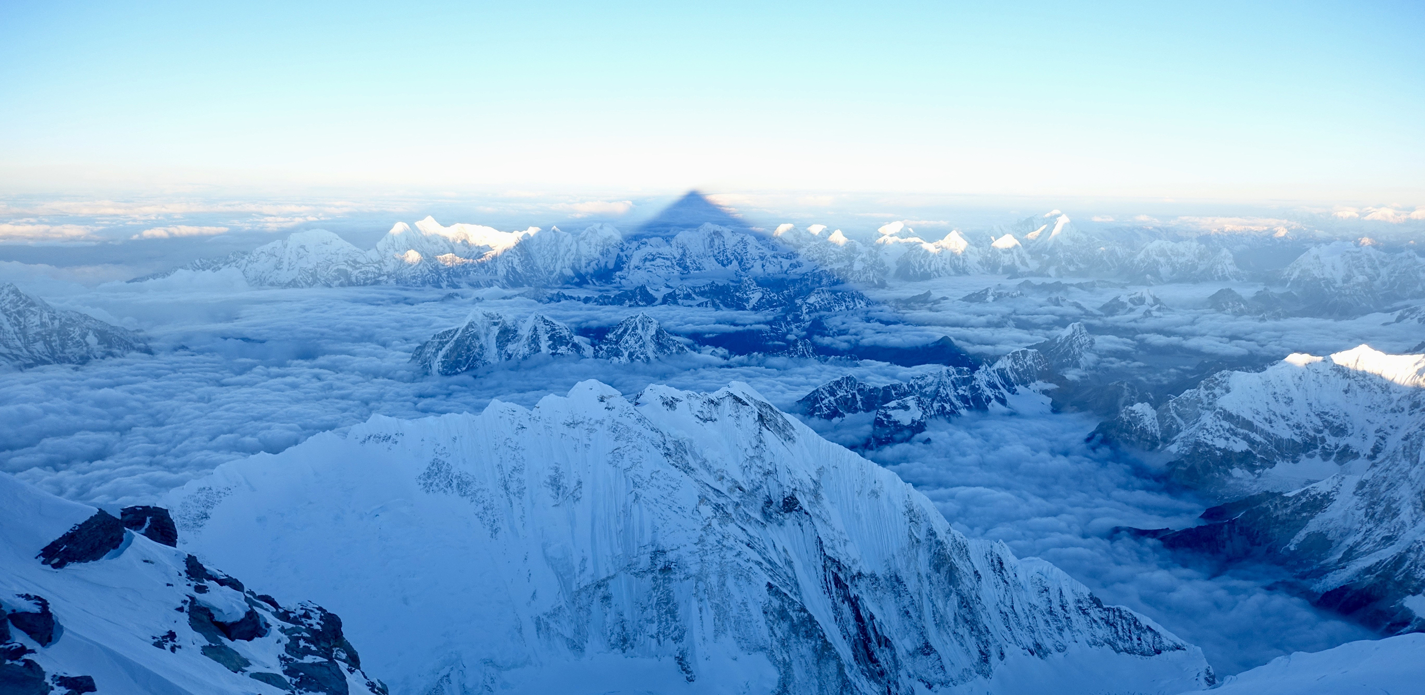 Dawn as Everest casts a shadow across the Himalaya