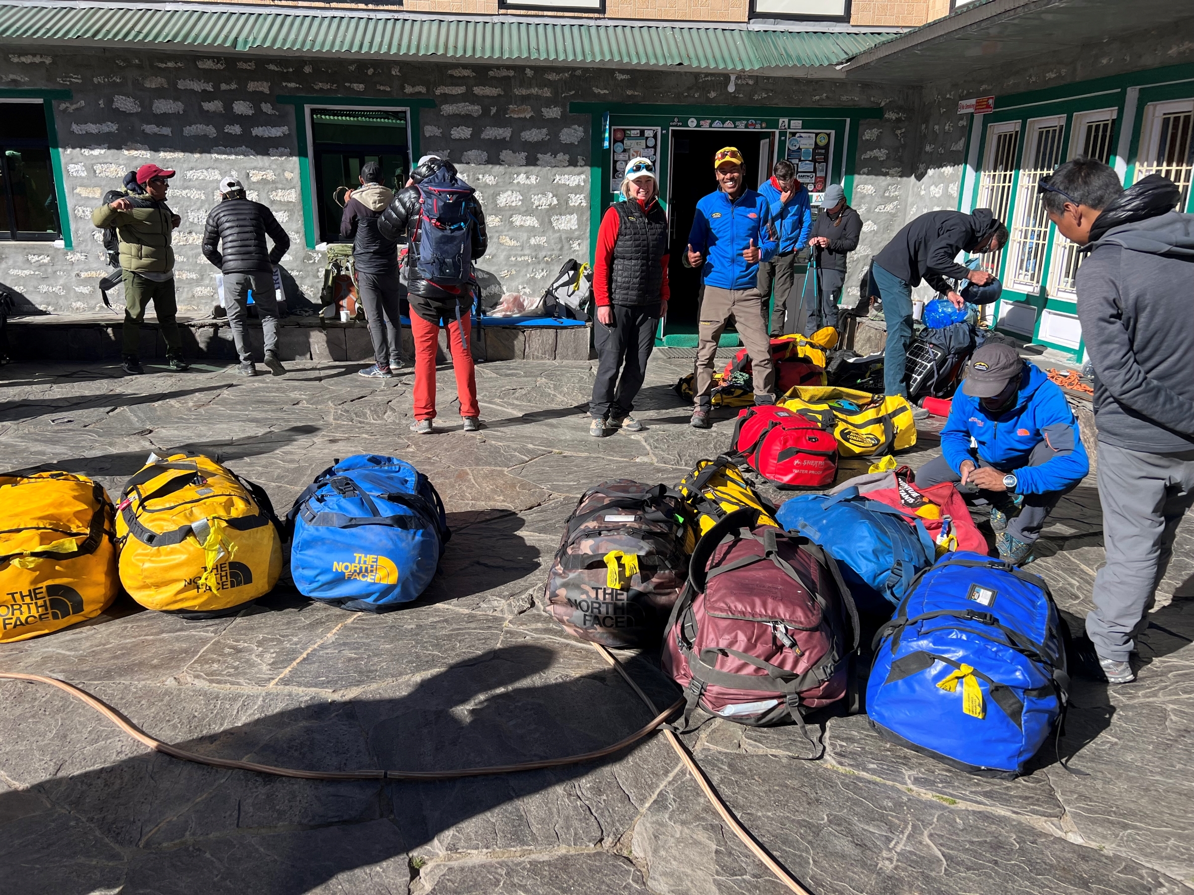 Climbers prepare their bags ready for porters