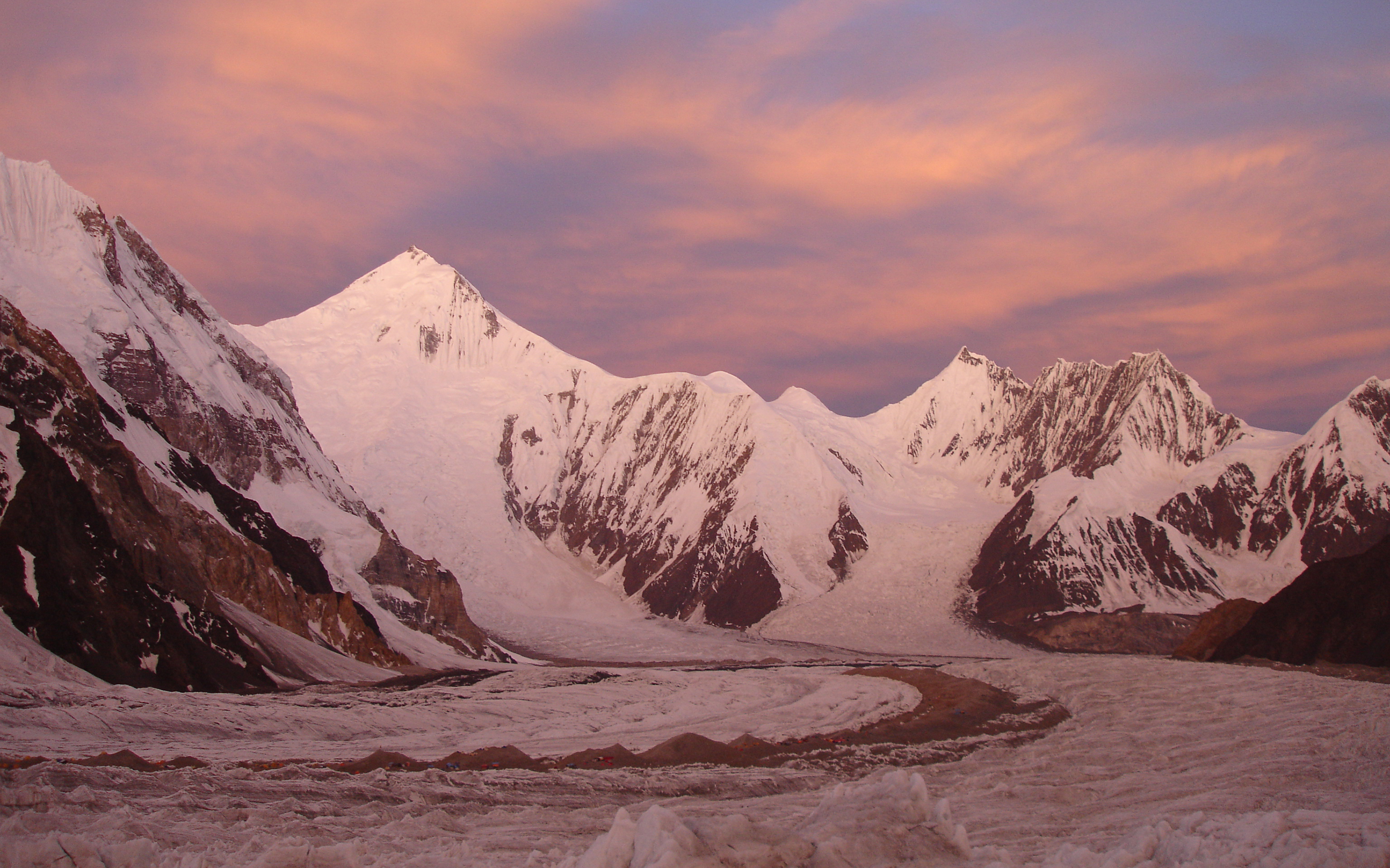Sunset glows pink and orange across the Karakorum. Photo by AC Guide Mike Roberts