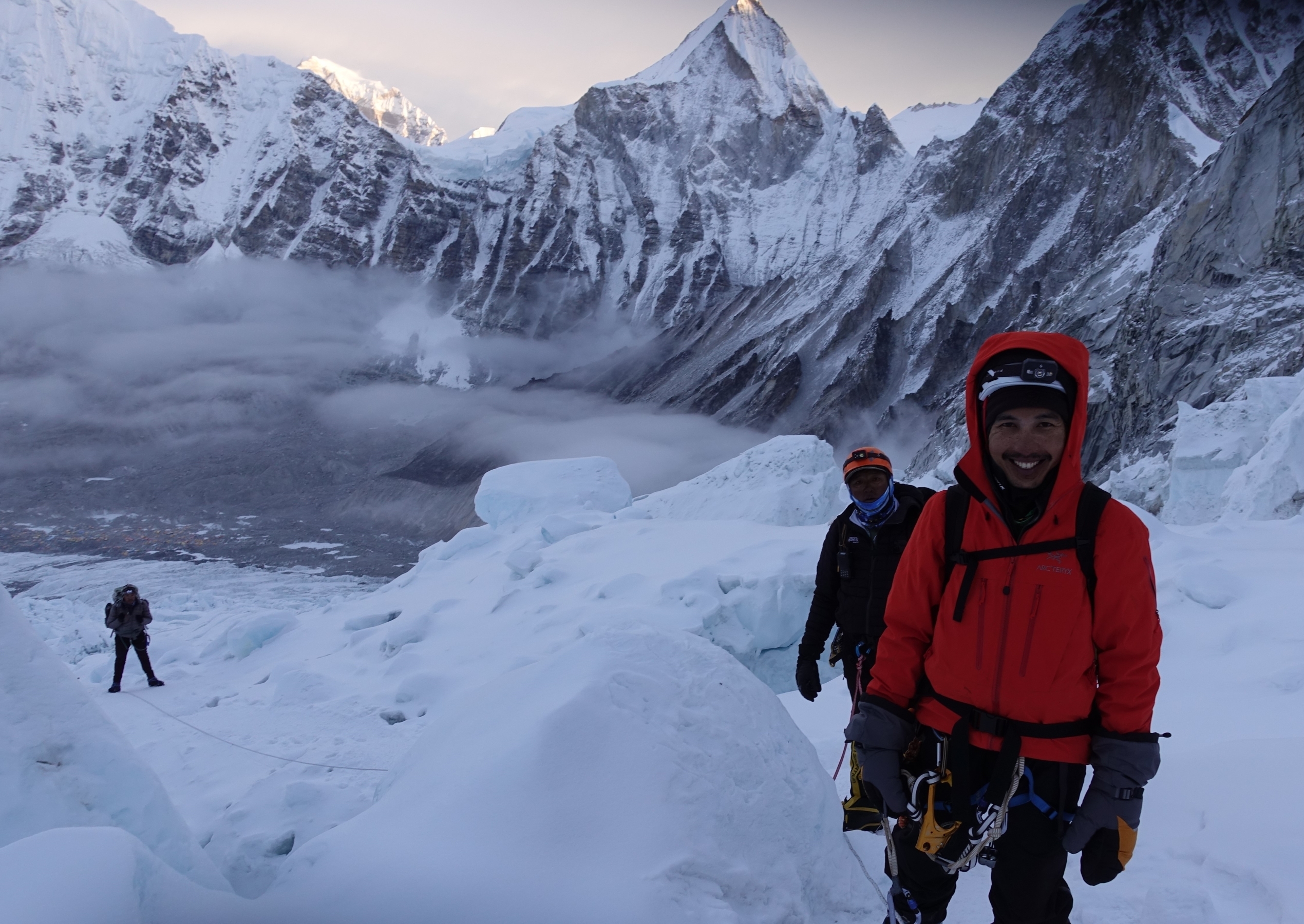 Climbers make their way through tumbling blocks of ice in the Khumbu Icefall.