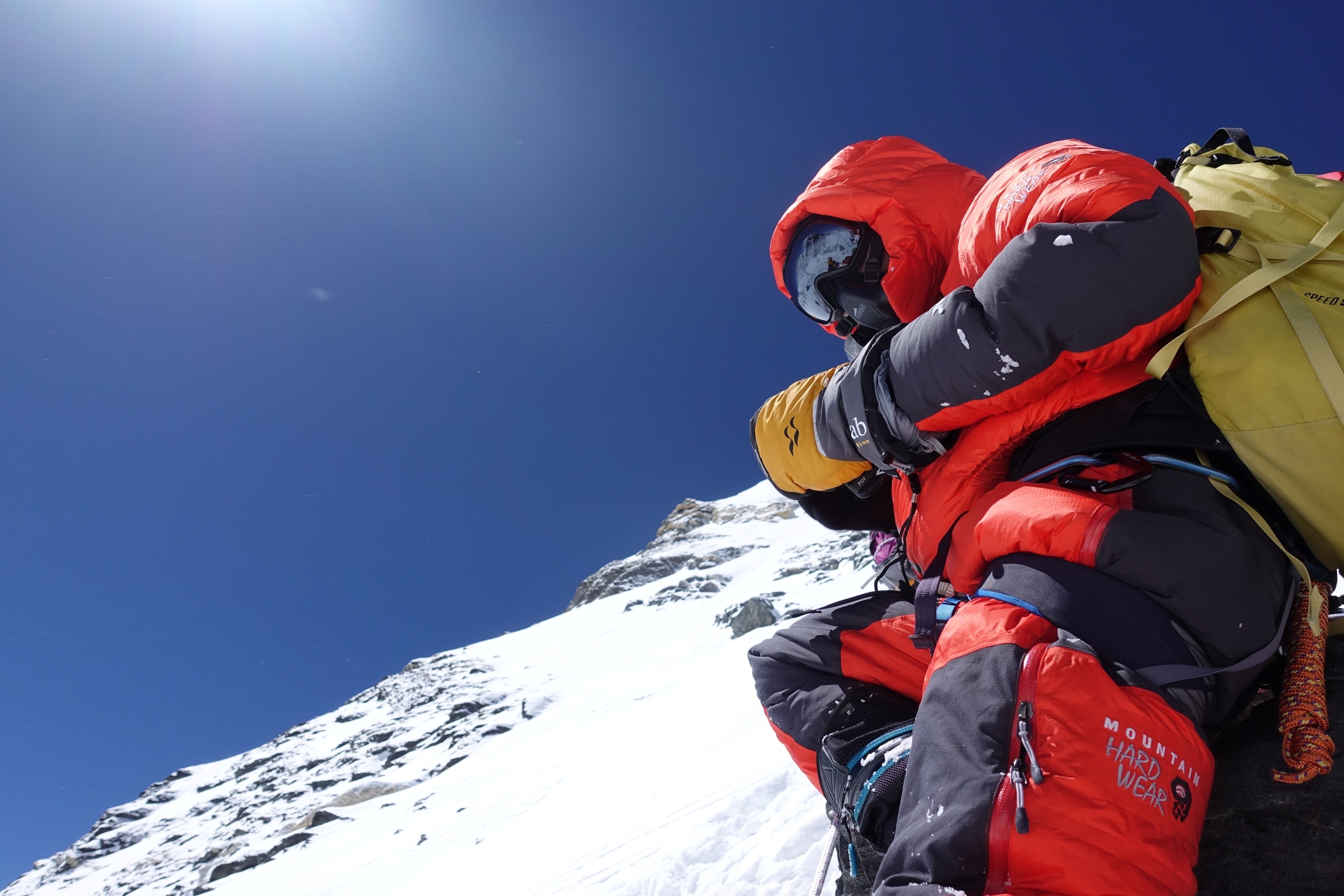 A climber high on the steep slopes of Mount Nuptse, Nepal.