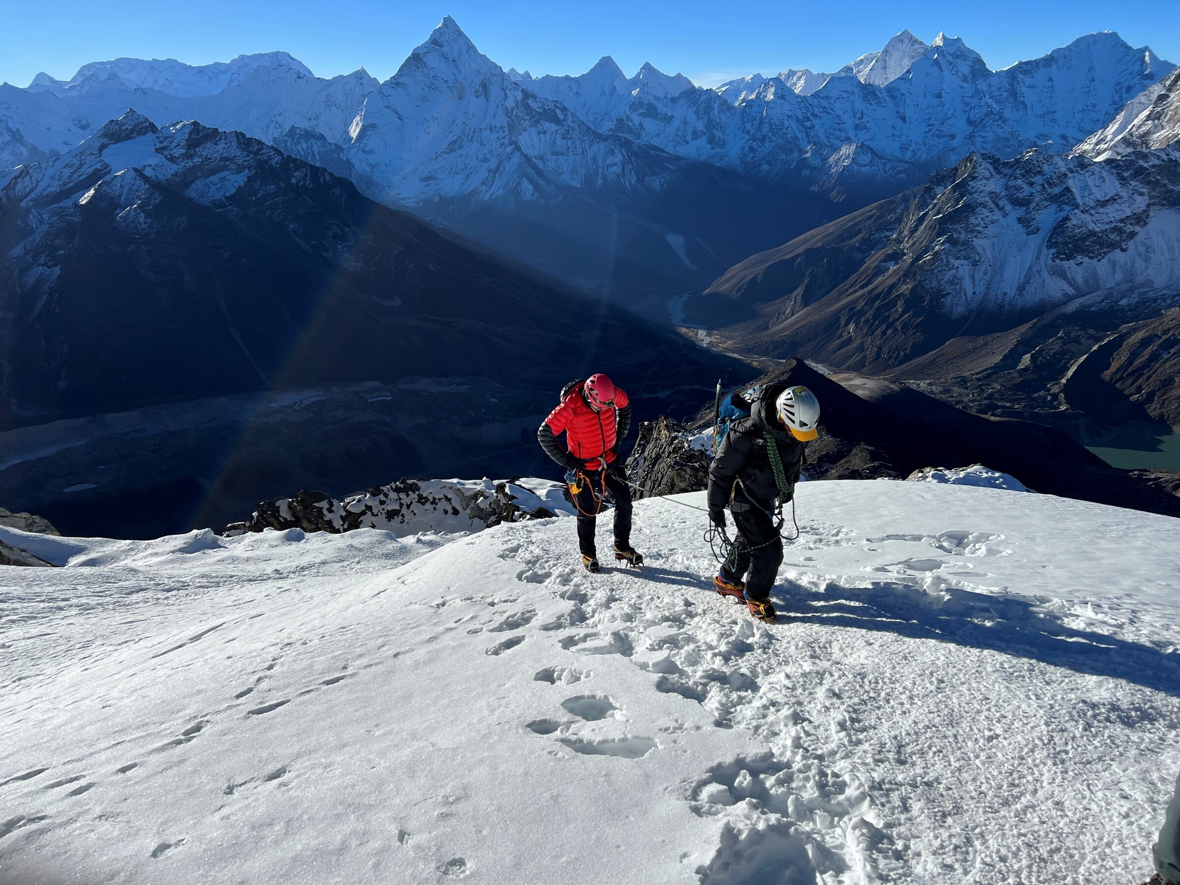 Climbers on snow slopes of Lobuche East