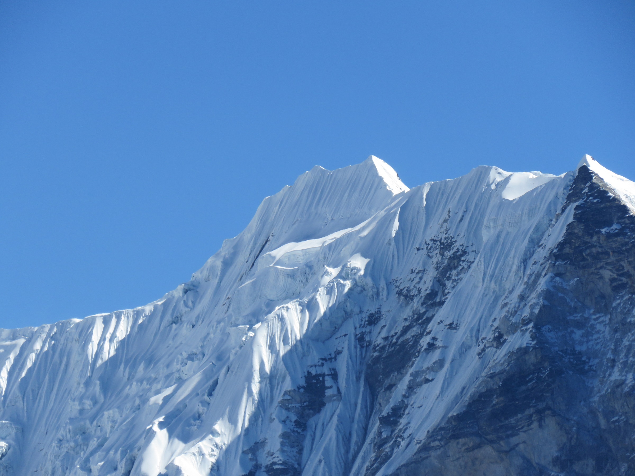Snow capped Island Peak summit ridge