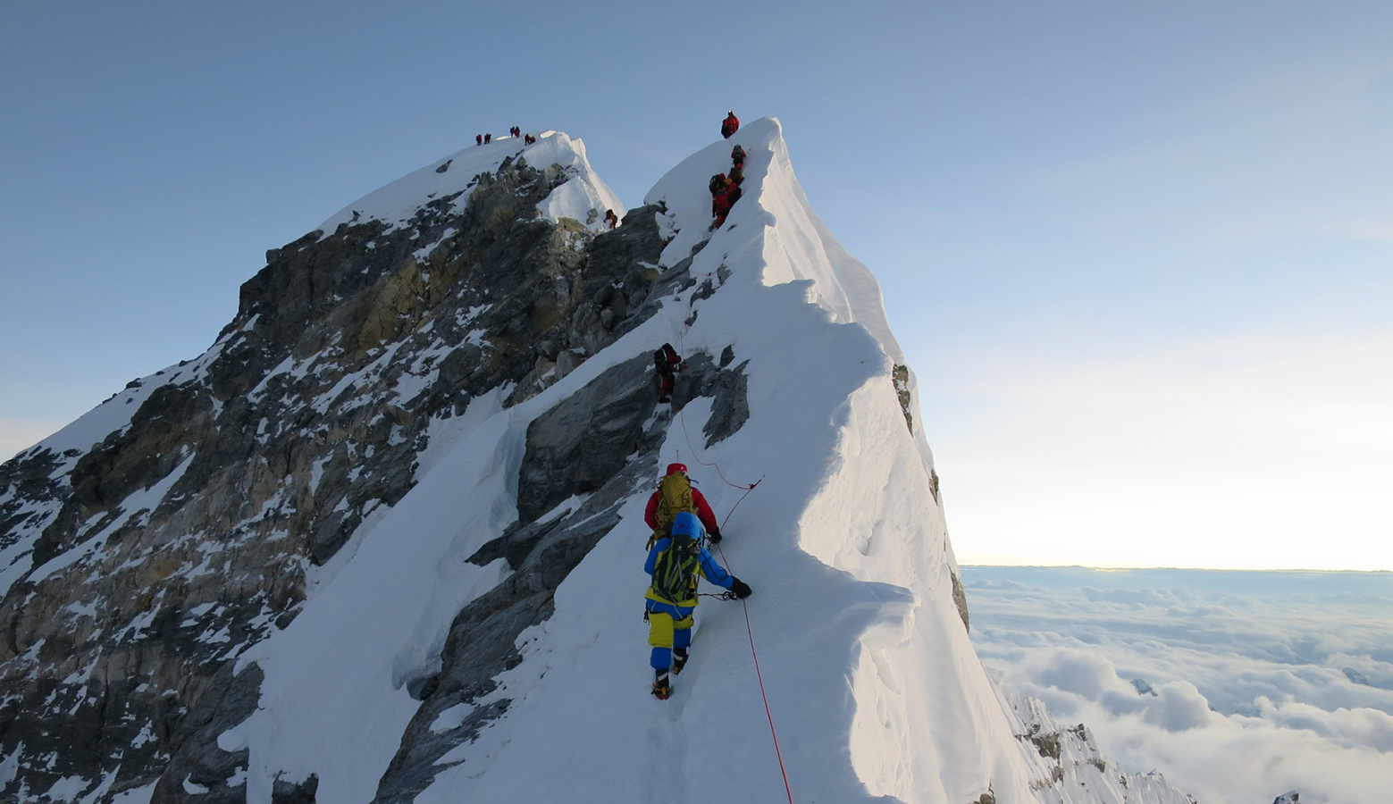 Climbers make their way from the South Summit of Everest towards the Hillary Step