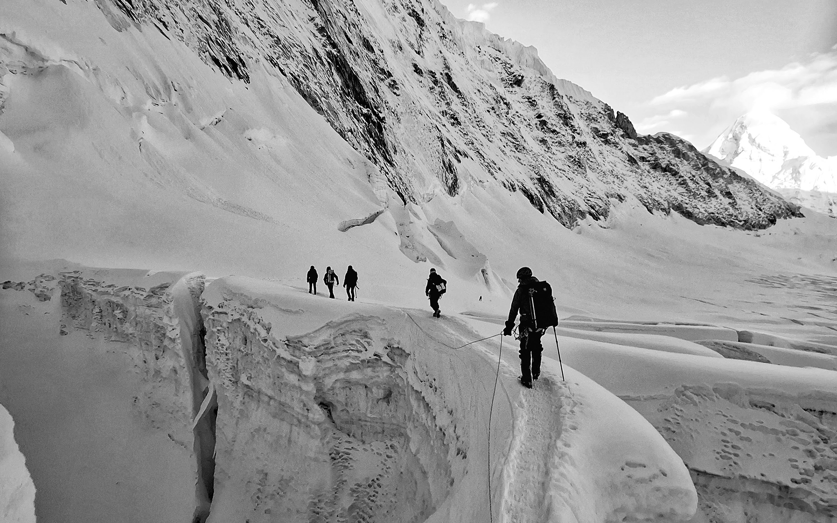 Climbers traverse crevasses near Camp 1 on Everest's Western Cwm. Photo by AC IFMGA Guide JB Chandesris