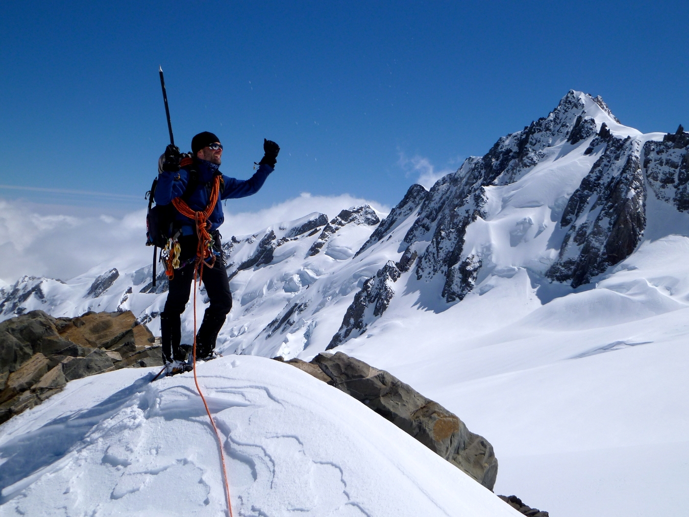 Climber celebrates a summit during the Technical Mountaineering Course