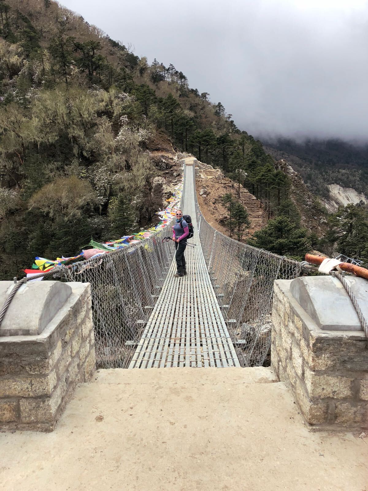 Dr Sophie Wallace crossing one of the many suspension bridges on the way into Everest Base Camp