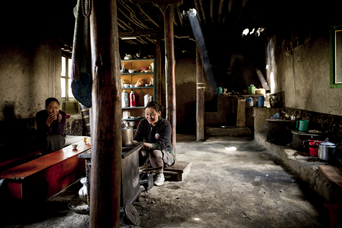 The girls at the monastery invited us into their kitchen for yak butter tea.