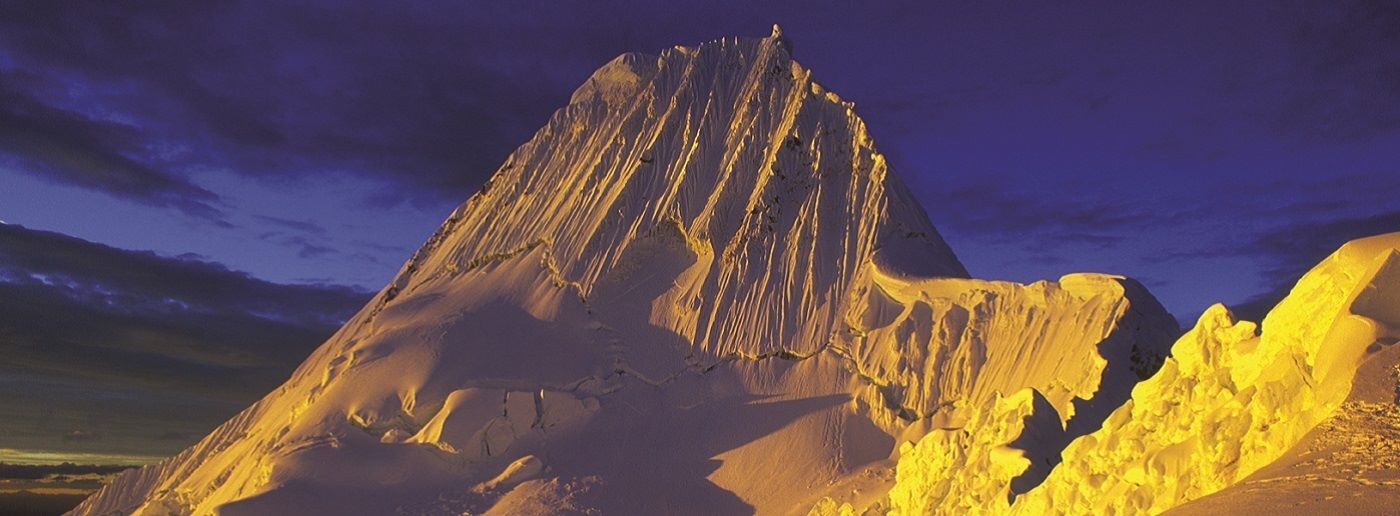 A spectacular orange sunset on Alpamayo