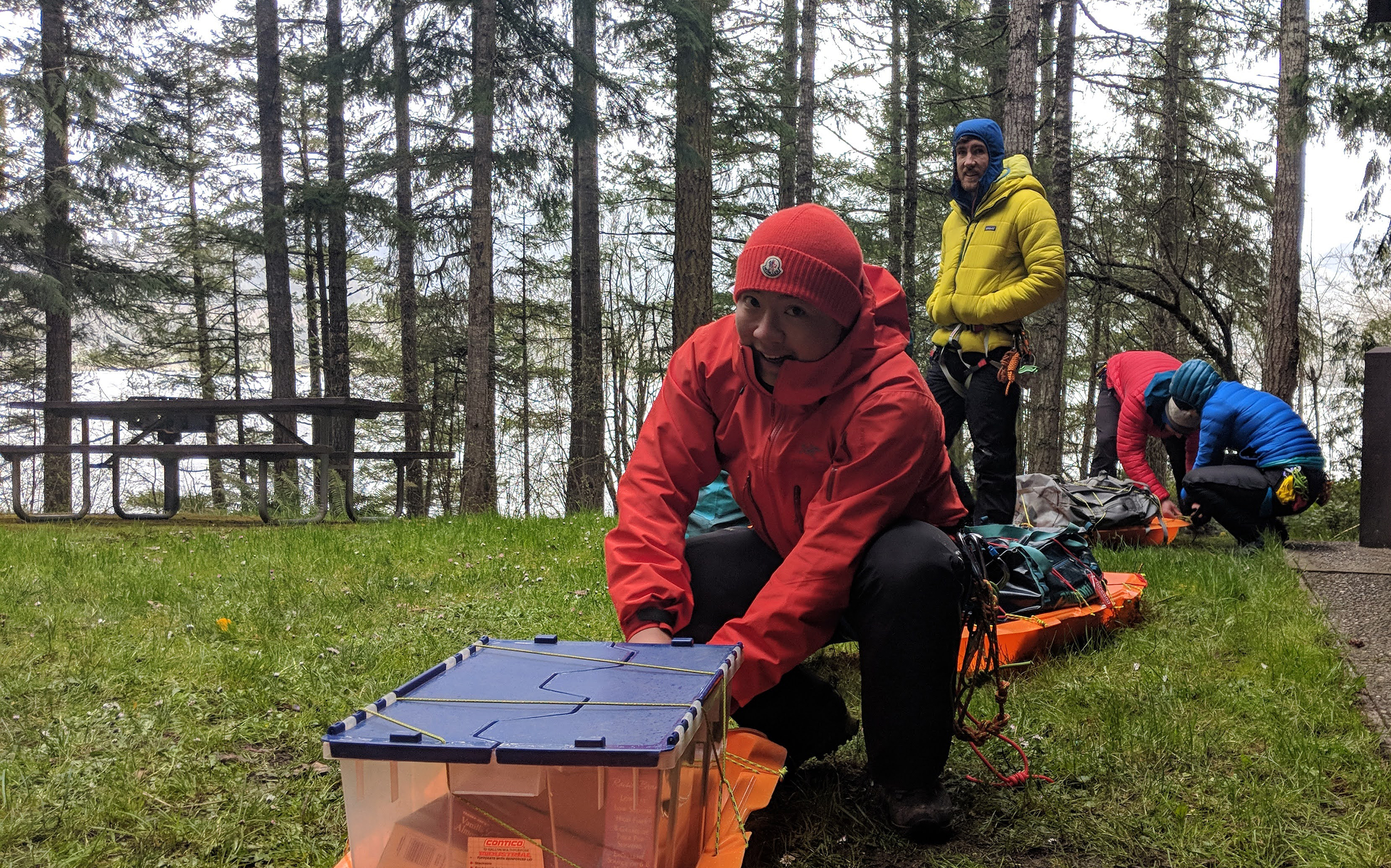 Climbers practice rigging their sleds prior to heading into the mountains on the Denali Prep Course