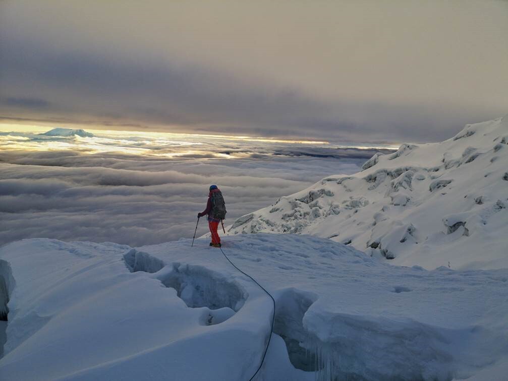 A climber on Cotopaxi, Ecuador at sunrise.